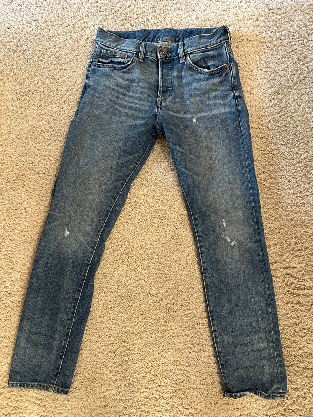 Woman’s 28/30 low rise Blue Jeans